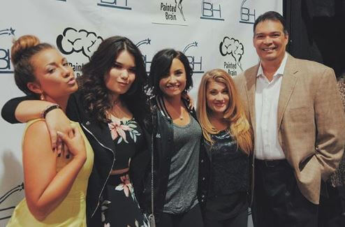 Patrick Lovato's ex-wife Dianna with her husband Eddie and children Dallas, Demi, and Madison.